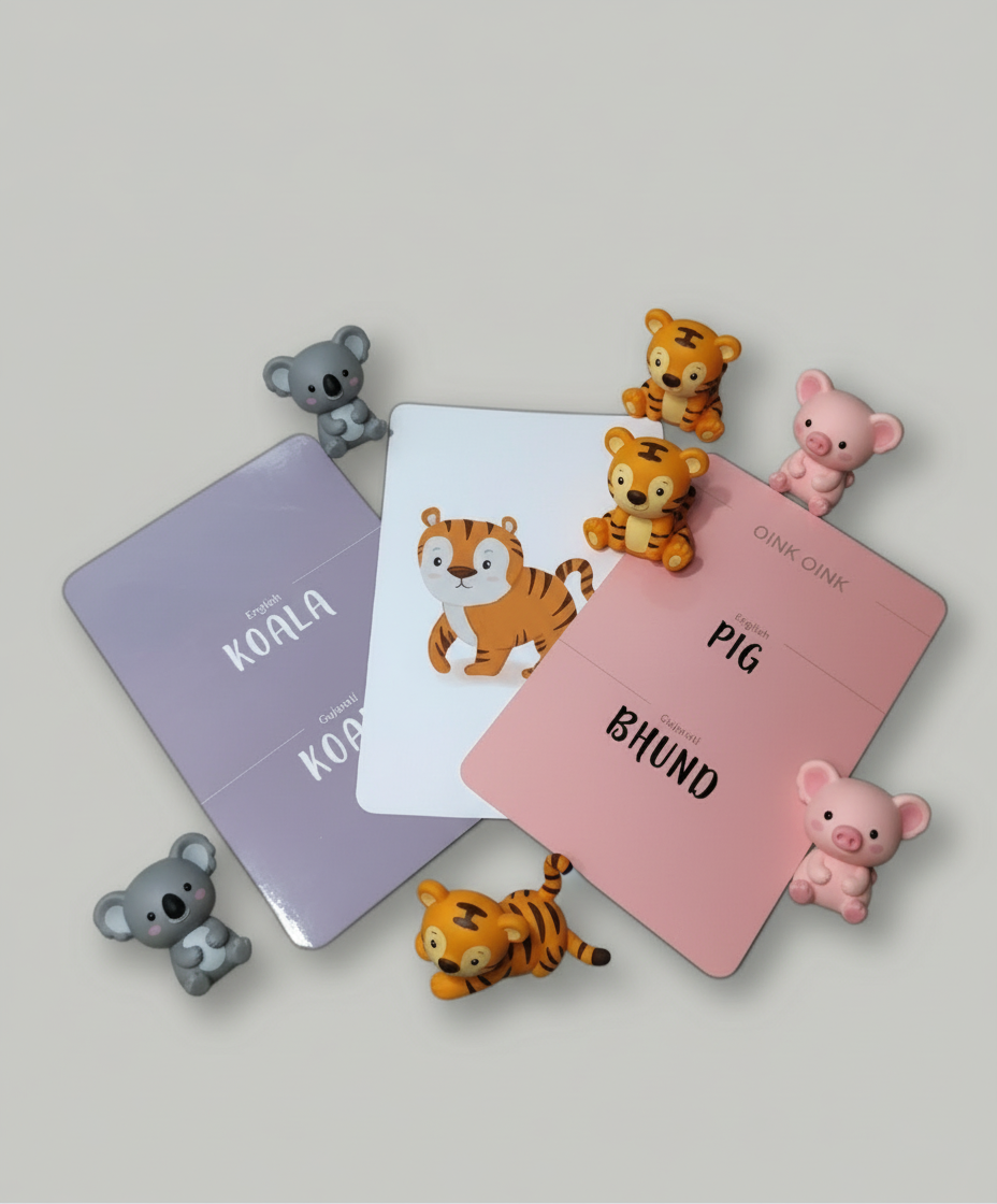 Small animal figurines with name cards on a light gray background